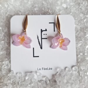 Orchidées veinées violettes au coeur orangé